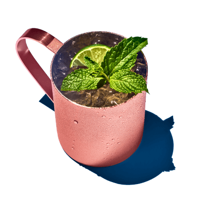 Enjoy a moscow mule drink in a classic copper mug.