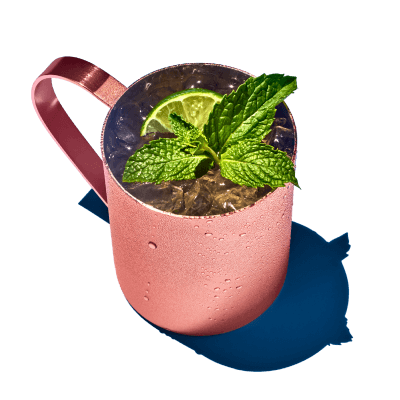 a moscow mule drink in a classic copper mug.